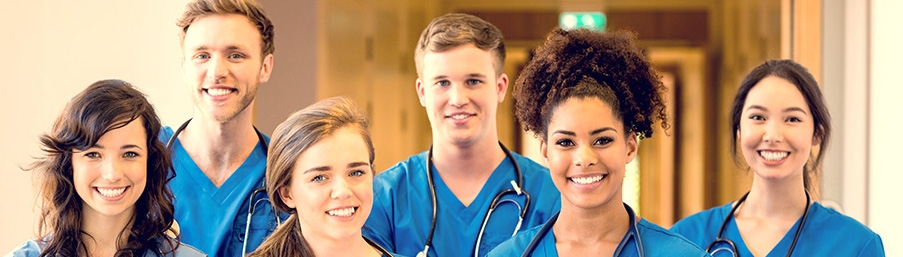 Medical Students Smiling Together in Hospital