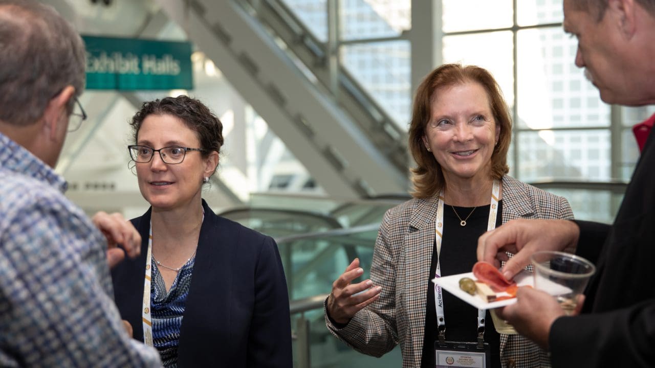 smiling people at a reception